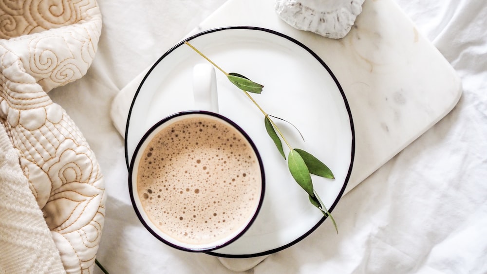 Caffeine Content: A Morning Cup of Coffee in a White Teacup