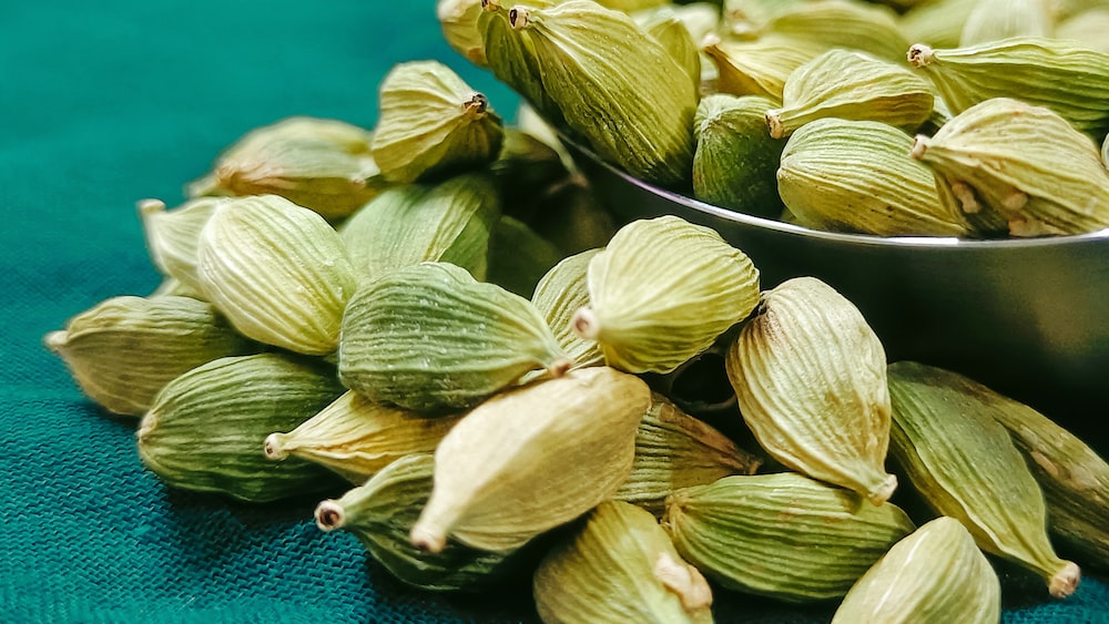 Cardamom Delight: A Bowl of Green Cardamom Seeds