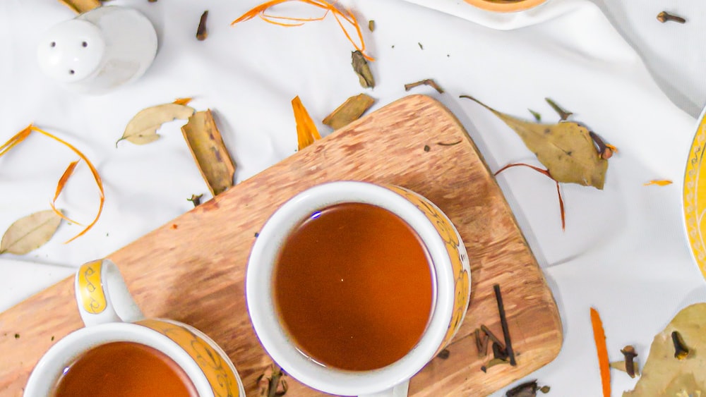 Invigorating Herbal Tea in a White Ceramic Mug
