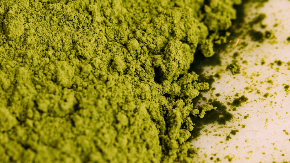 Matcha Tea: A Visual Delight of Green Powder on a White Surface