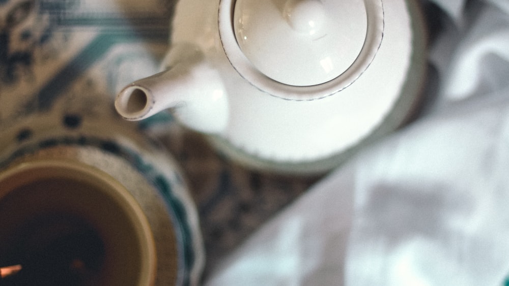 Matcha Tea Latte ingredients in a white ceramic teapot