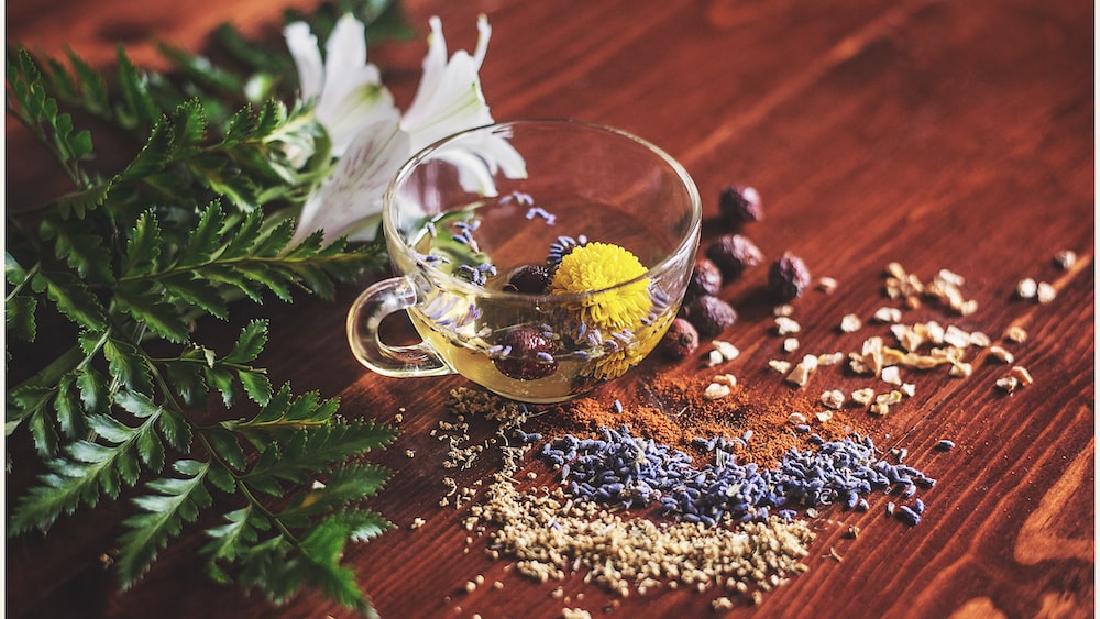 Oolong Tea: A Clear Tea Cup on a Brown Surface