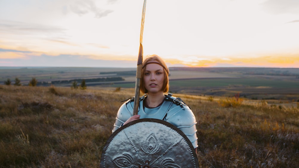 Polyphenol Shield: Empowering Woman with a Sword and Shield in a Field