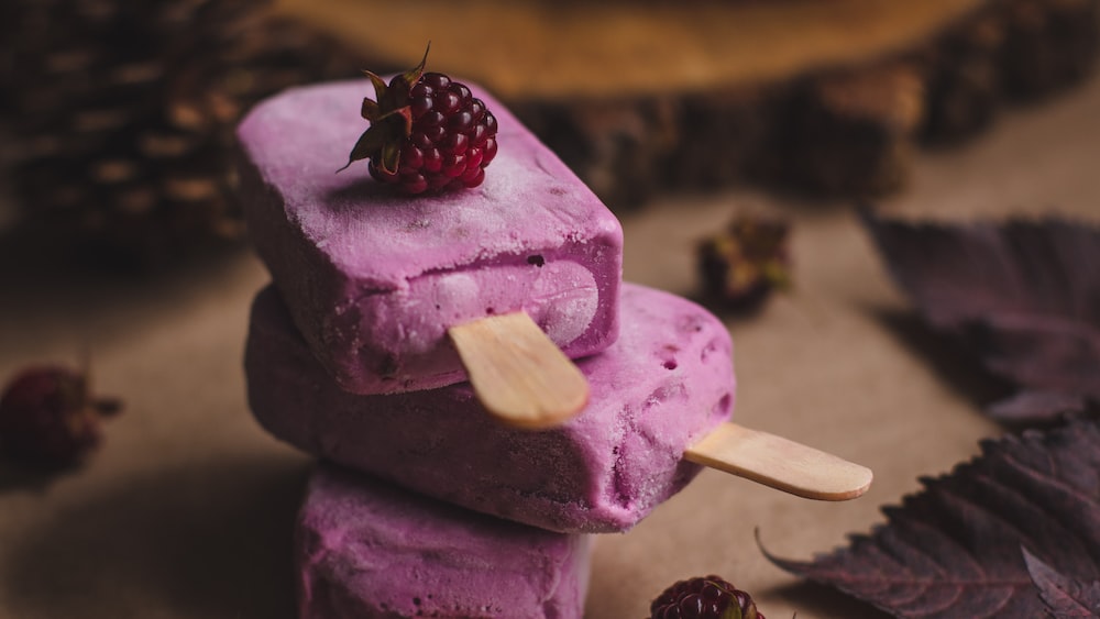 Popsicles: Autumnal Treats with Purple Ice Pops near Pine Cones