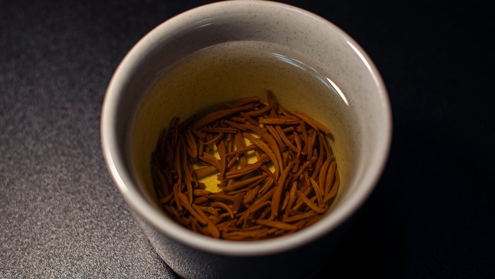 Pu Erh Tea in White Ceramic Mug