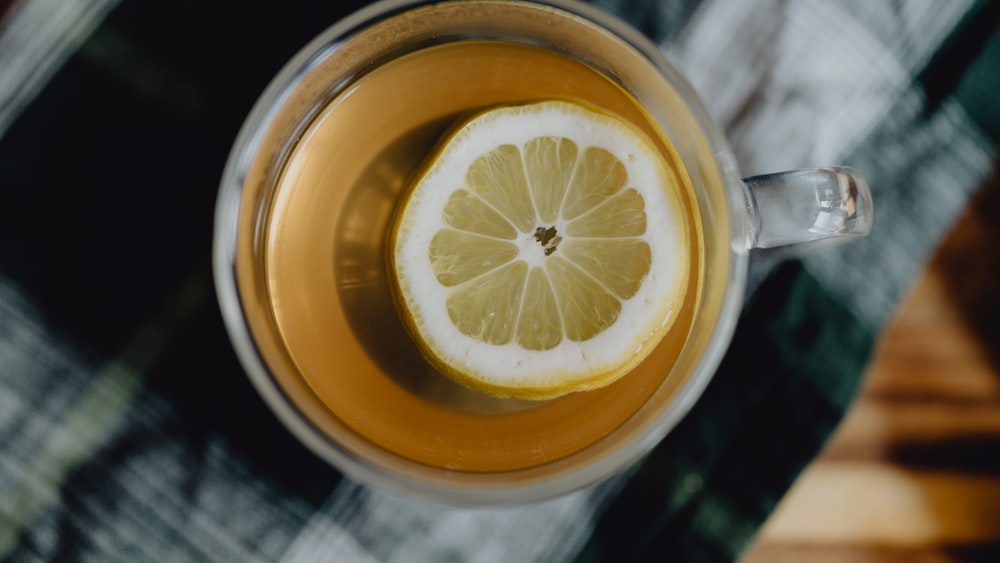 Refreshing Cup of Needle Ku Ding Tea with a Slice of Lemon