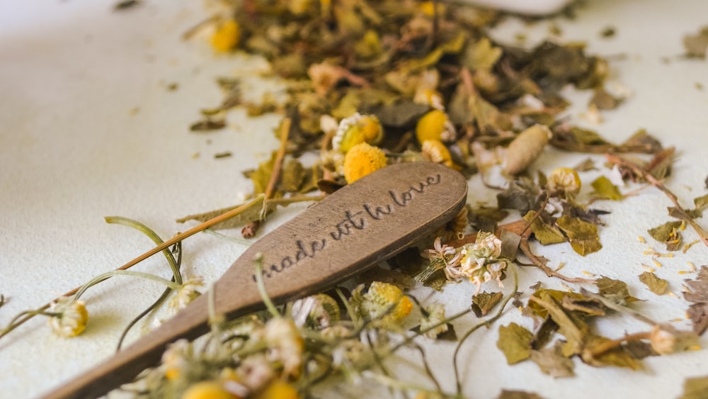 Refreshing Herbal Tea: Delightful Chamomile Infusion in a White Ceramic Container