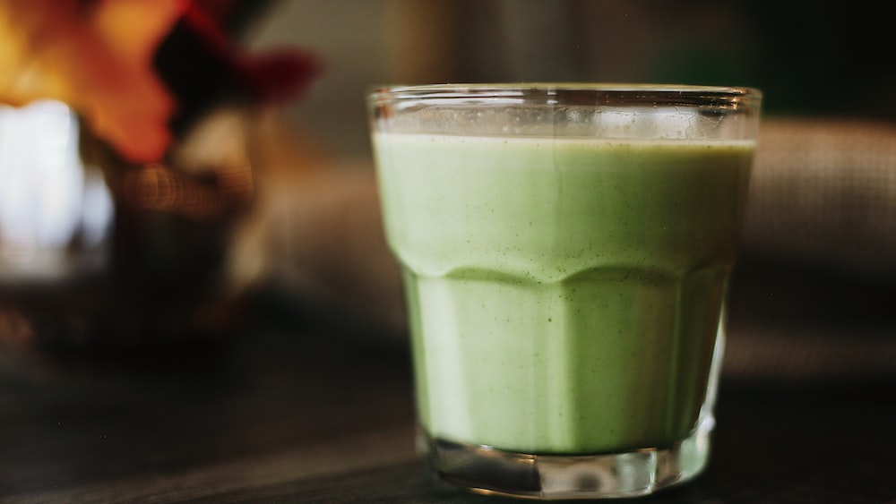 Refreshing Matcha Tea Latte in a Clear Glass
