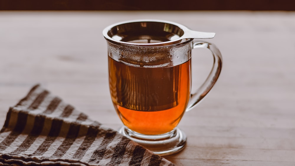 Refreshing Peppermint Tea in a Clear Glass Mug