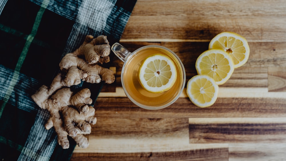 Tea Brewing: A Refreshing Cup of Green Tea with Citrus, Lemon, and Ginger