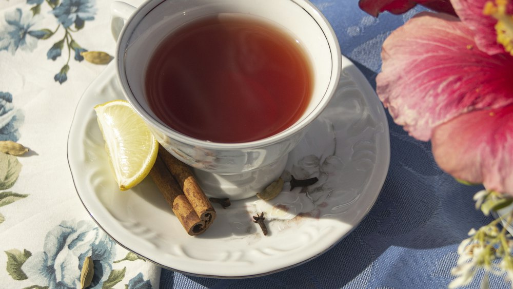 Tea Time Elegance: A Cup of Tea, Napkin, and a Flower